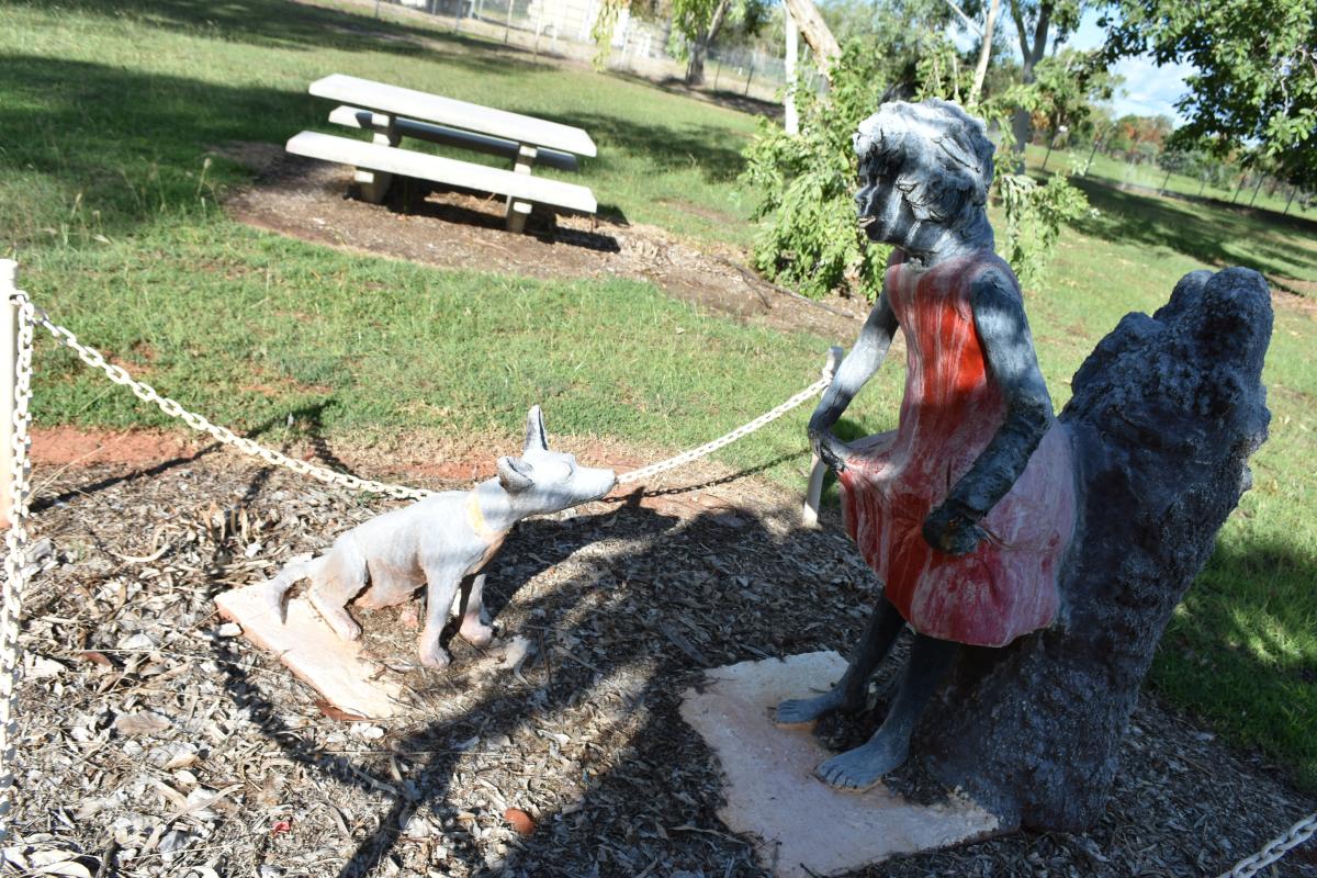 Statue of a girl and her dog