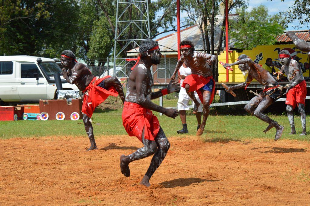 Five Indigenous men dancing at Barunga Festival