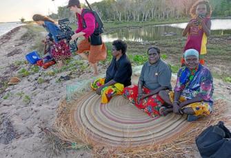 Numbulwar Artists getting ready to be filmed on Country