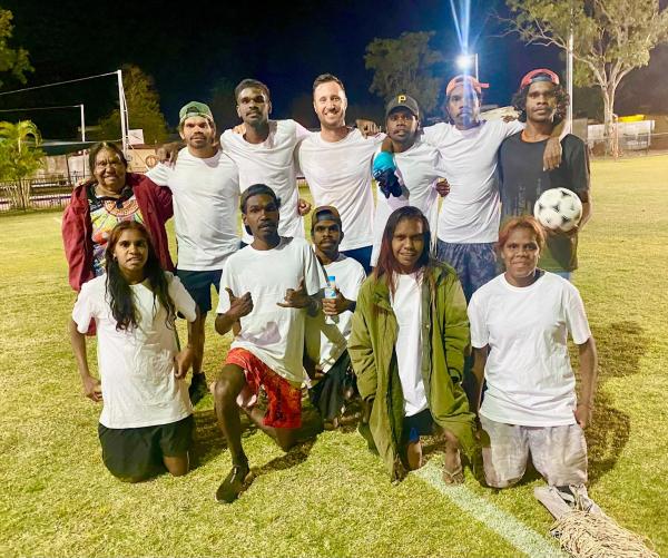 Group photo on a soccer field 