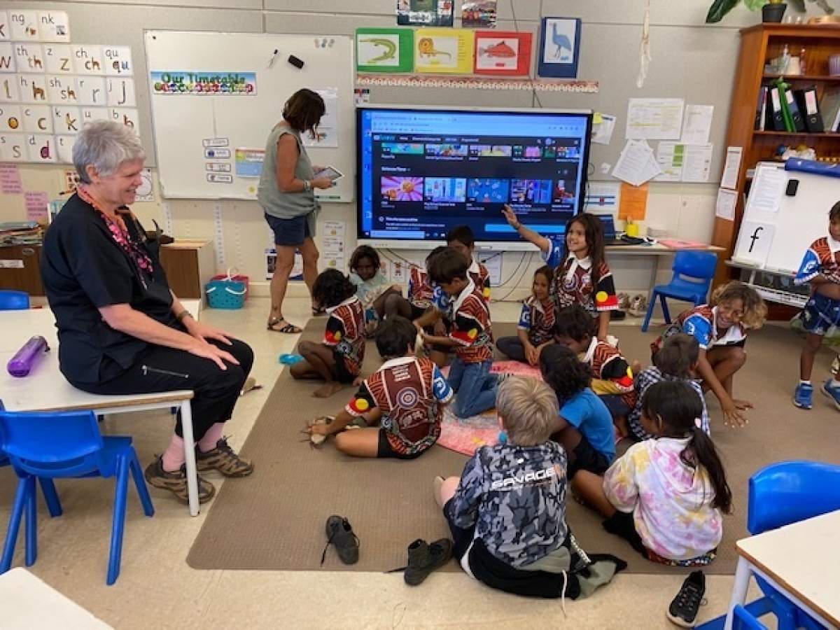 Vet Nurse and young students in classroom
