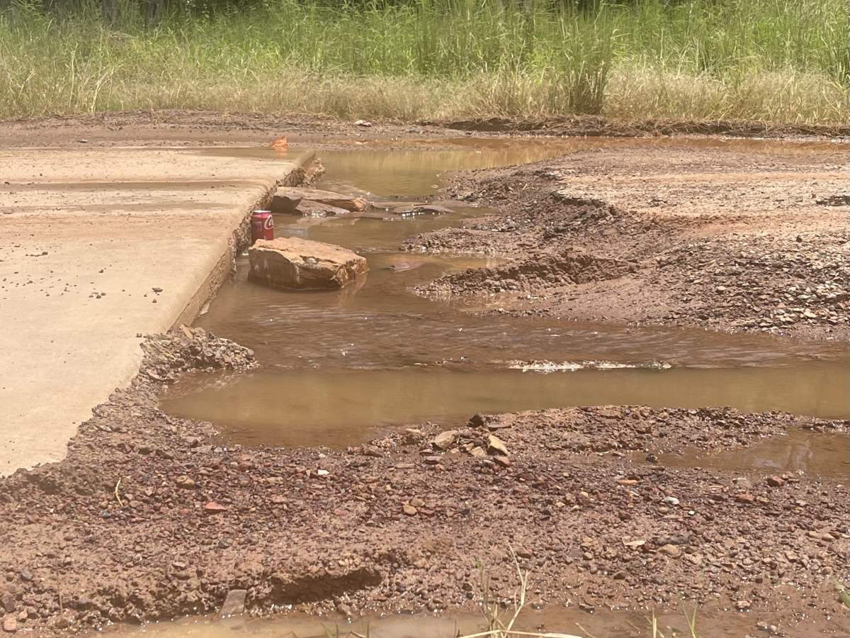 Major road damage after flooding